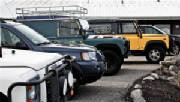 Land Rovers Near Boston, MA Lined Up And Waiting For Repairs